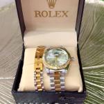 Gold and silver men's watch and bracelet